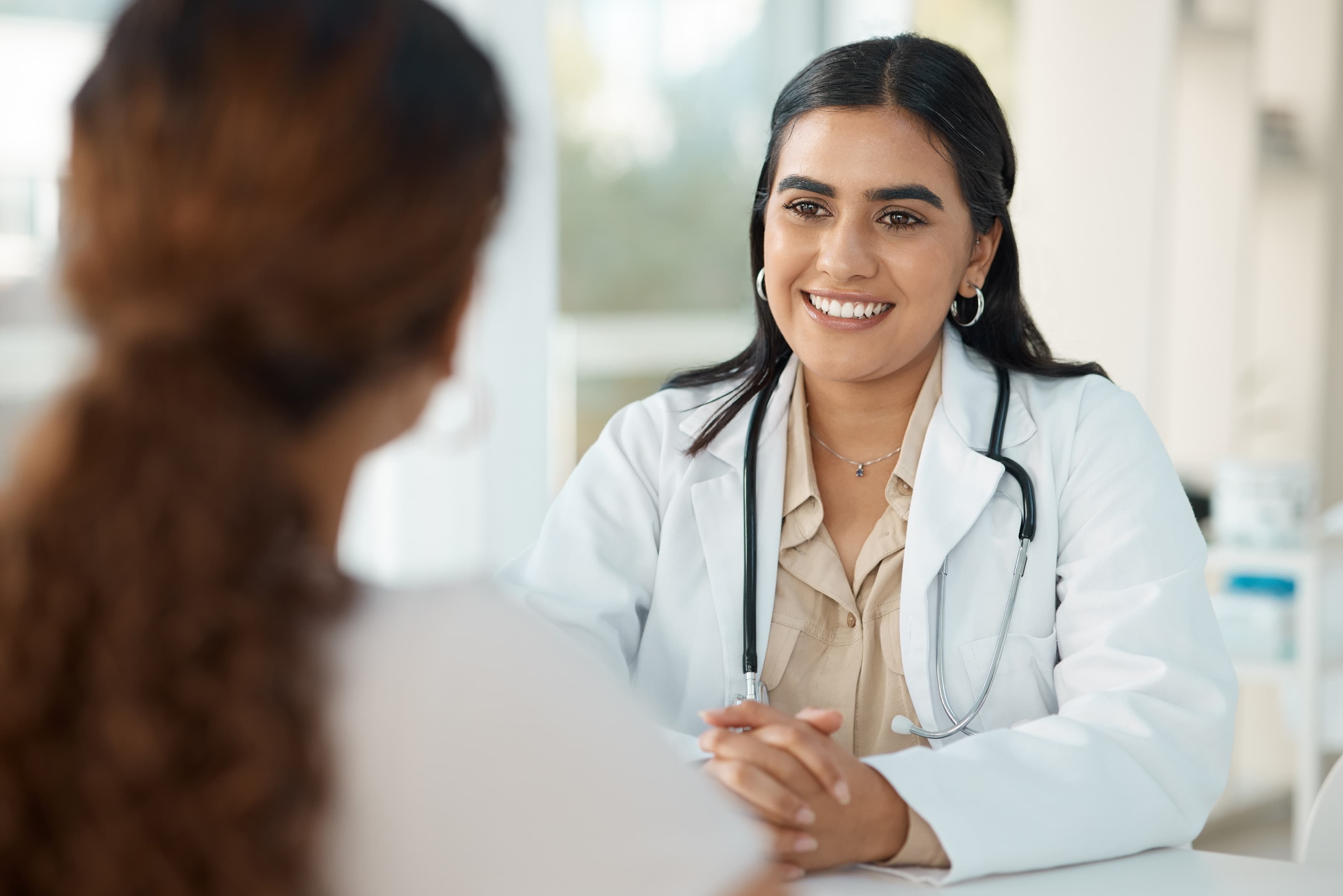 A patient discussing care with a gynaecology specialist
